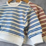 دورس رینگر نقلی طرح خانه راه راه آبی/زرشکی 6 ماه تا 3 سال - تصویر 2