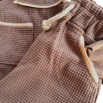 ست بیسکوئیتی نقلی مغزی دوزی سرمه ای/شکلاتی شده 6 ماه تا 4 سال - تصویر 12